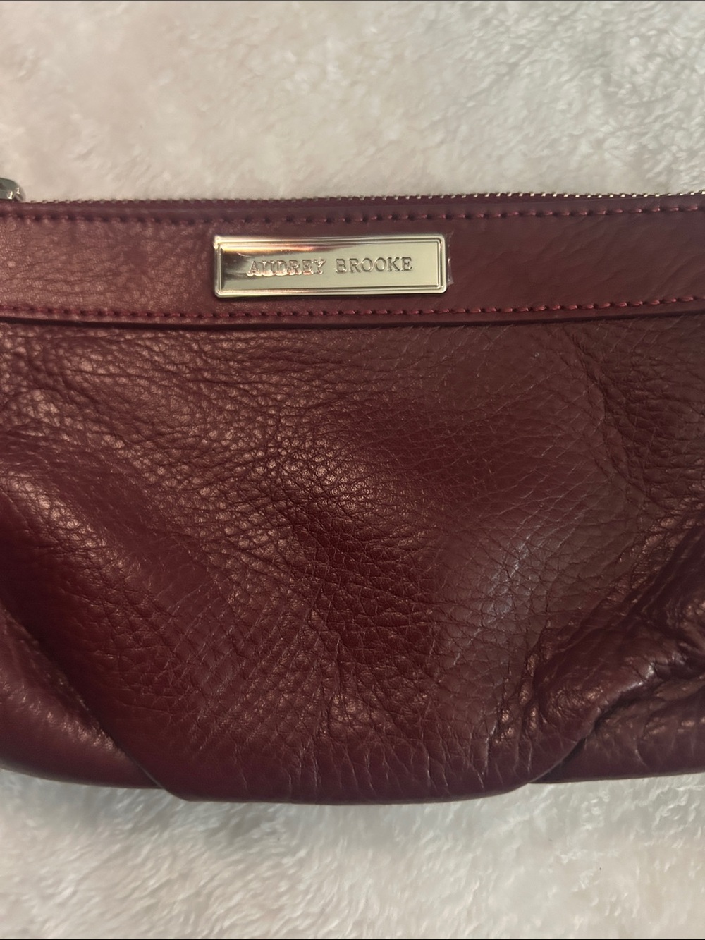 Audrey Brooke Burgundy Leather Wristlet with Silver Logo Plate